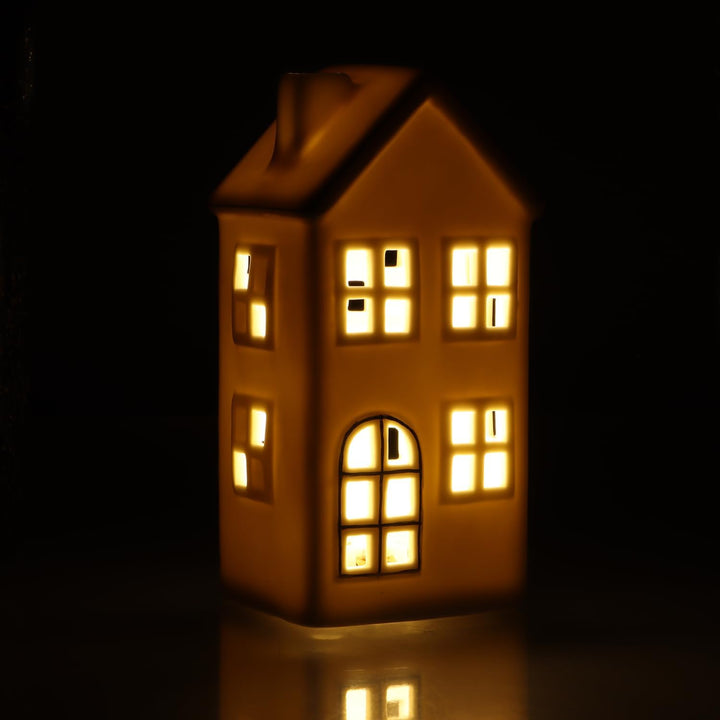 com-four® LED-Haus aus Porzellan - batteriebetriebenes Leuchthaus - weisses glänzendes Deko-Lichthäu