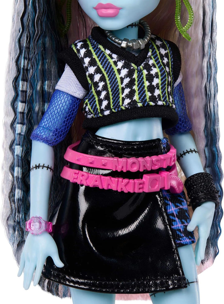 Monster High-Puppe, Frankie Stein in bauchfreiem Pullover und schwarzem Lederrock mit Hund Watzie un