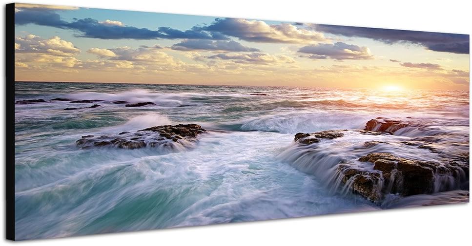 Paul Sinus Art Panoramabild auf Leinwand und Keilrahmen 150x50cm Meer Felsen Wellen Sonnenstrahlen