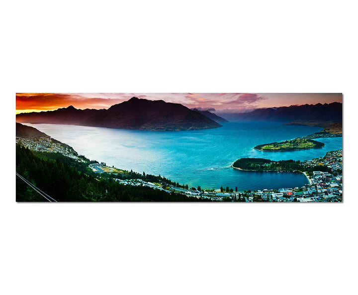 Paul Sinus Art Panoramabild auf Leinwand und Keilrahmen 150x50cm See Stadt Berge Landschaft Dämmerun