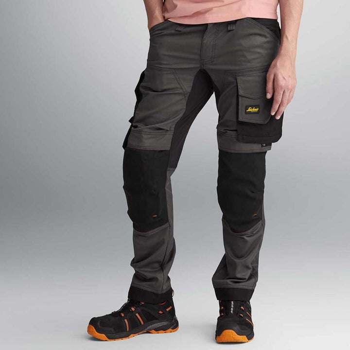 Snickers Workwear Unisex Pantalones Elásticos Negro Talla AllroundWork Elastische Hose, Schwarz, Grö