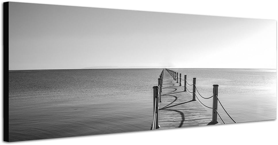 Paul Sinus Art Panoramabild auf Leinwand und Keilrahmen 150x50cm Meer Holzsteg schwarz/weiss